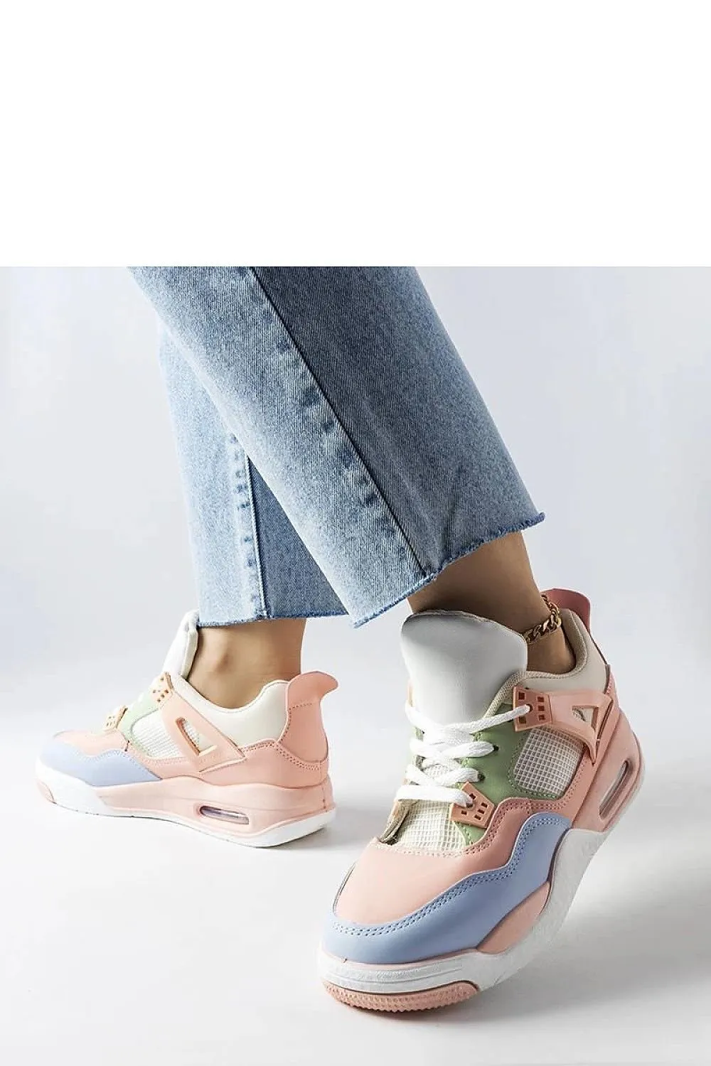 Beige sneakers on white rubber sole