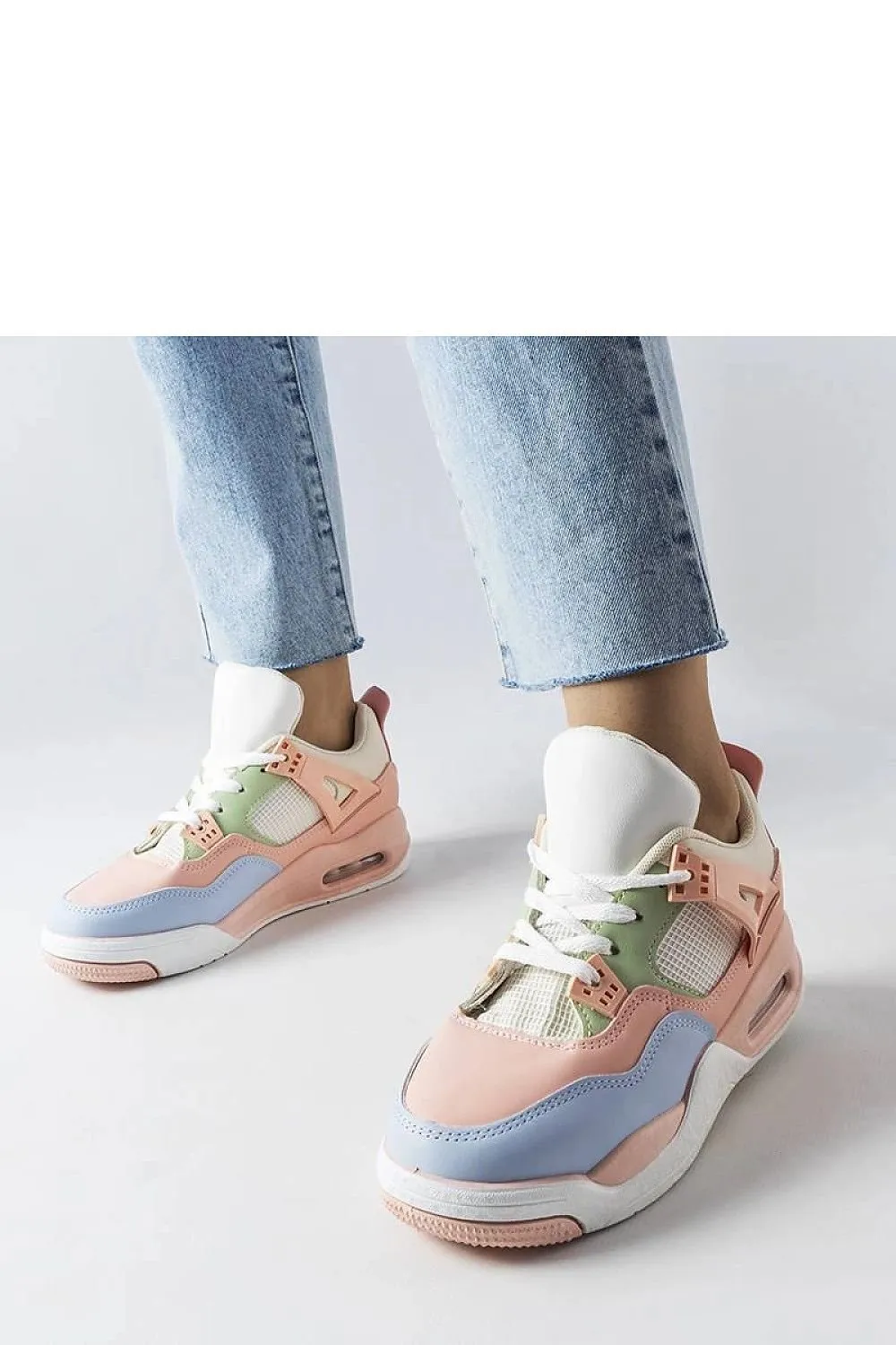 Beige sneakers on white rubber sole